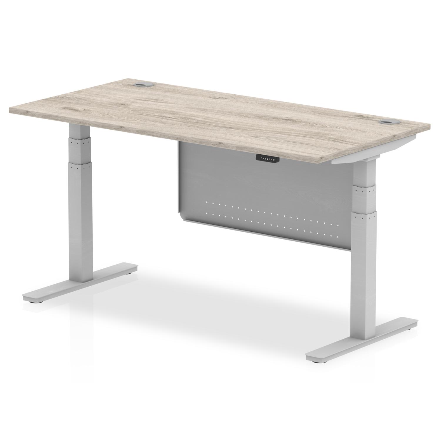 Air Modesty 1600 x 800mm Height Adjustable Office Desk Grey Oak Top Cable Ports Silver Leg With Silver Steel Modesty Panel