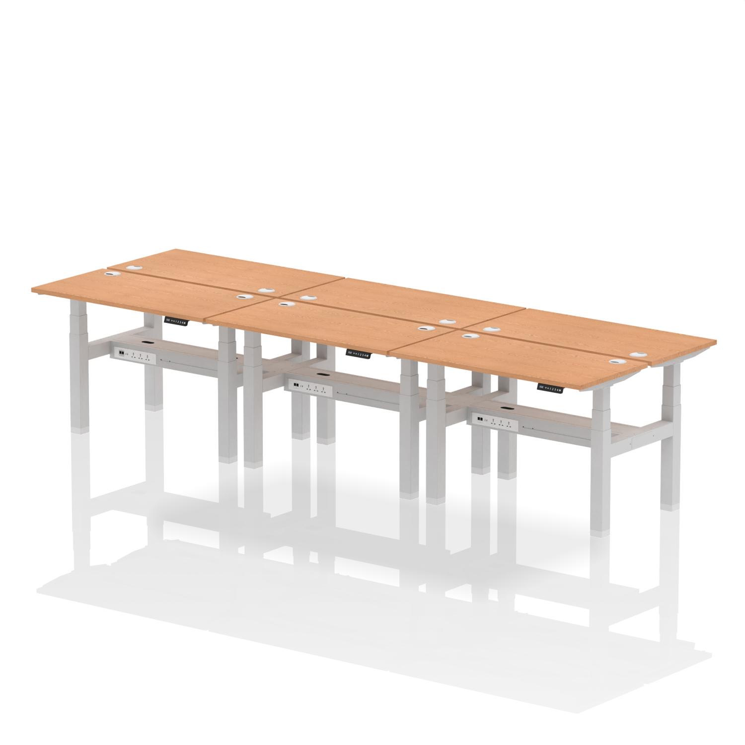 Air Back-to-Back 1200 x 600mm Height Adjustable 6 Person Office Bench Desk Oak Top with Cable Ports Silver Frame