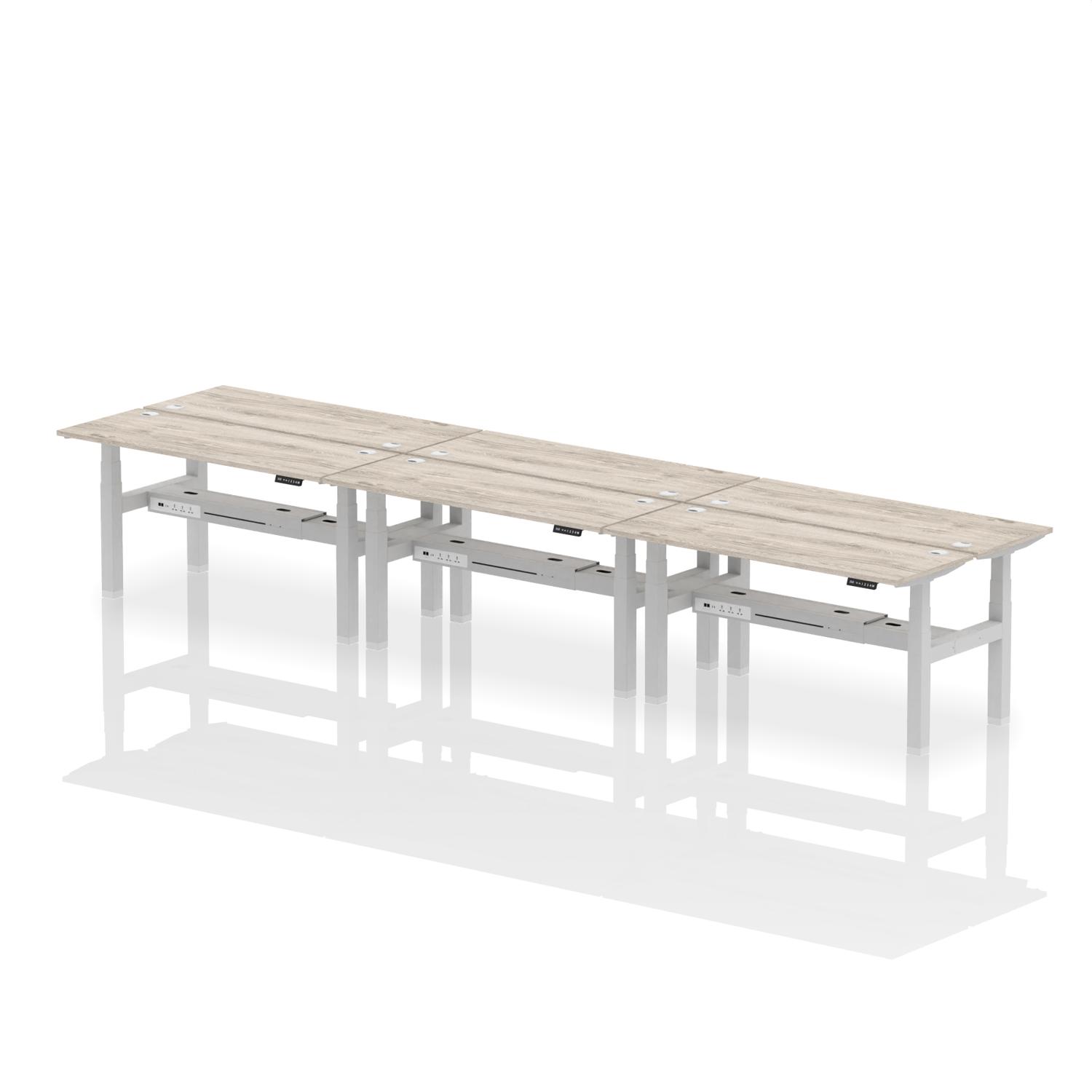 Air Back-to-Back 1600 x 600mm Height Adjustable 6 Person Office Bench Desk Grey Oak Top with Cable Ports Silver Frame