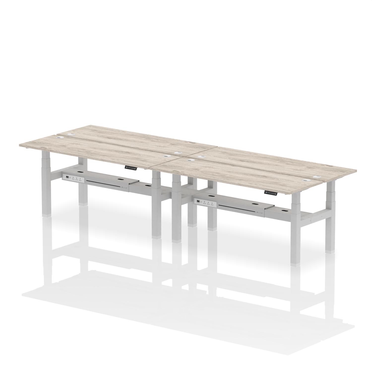 Air Back-to-Back 1800 x 600mm Height Adjustable 4 Person Office Bench Desk Grey Oak Top with Cable Ports Silver Frame