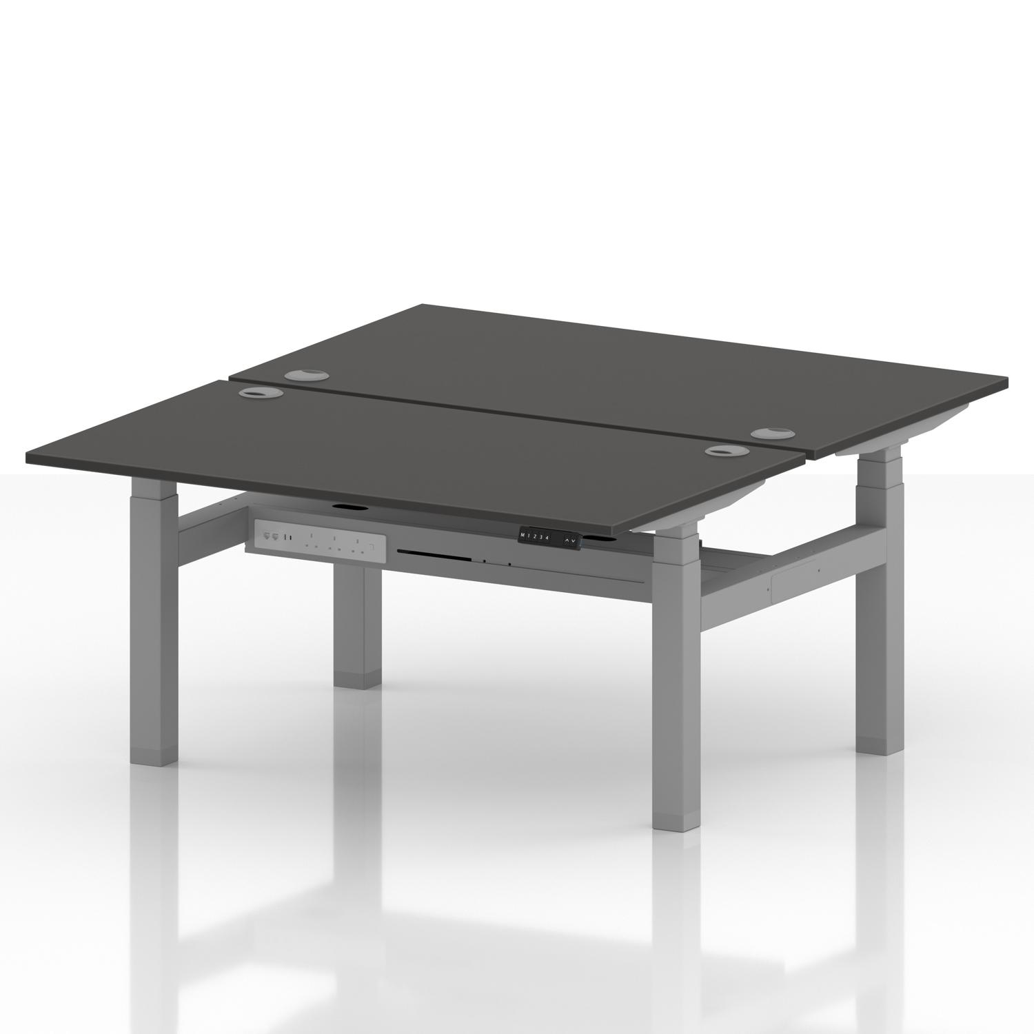 Air Back-to-Back 1400 x 800mm Height Adjustable 2 Person Office Bench Desk Carbon Grey Top with Cable Ports Silver Frame Air Back-to-Back 1400 x 800mm Height Adjustable 2 Person Office Bench Desk Carbon Grey Top with Cable Ports Silver Frame