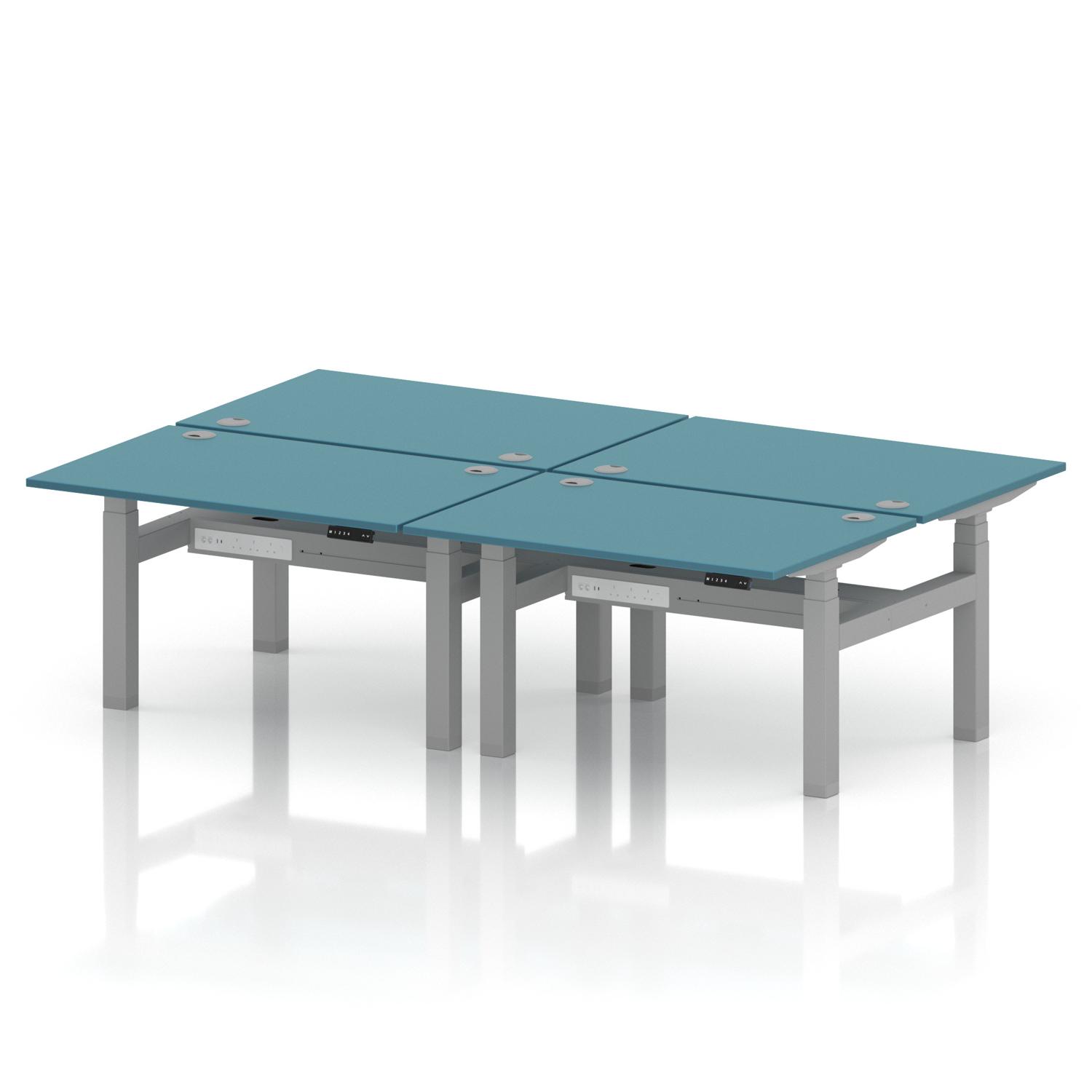 Air Back-to-Back 1200 x 800mm Height Adjustable 4 Person Office Bench Desk Dark Teal Top with Cable Ports Silver Frame Air Back-to-Back 1200 x 800mm Height Adjustable 4 Person Office Bench Desk Dark Teal Top with Cable Ports Silver Frame