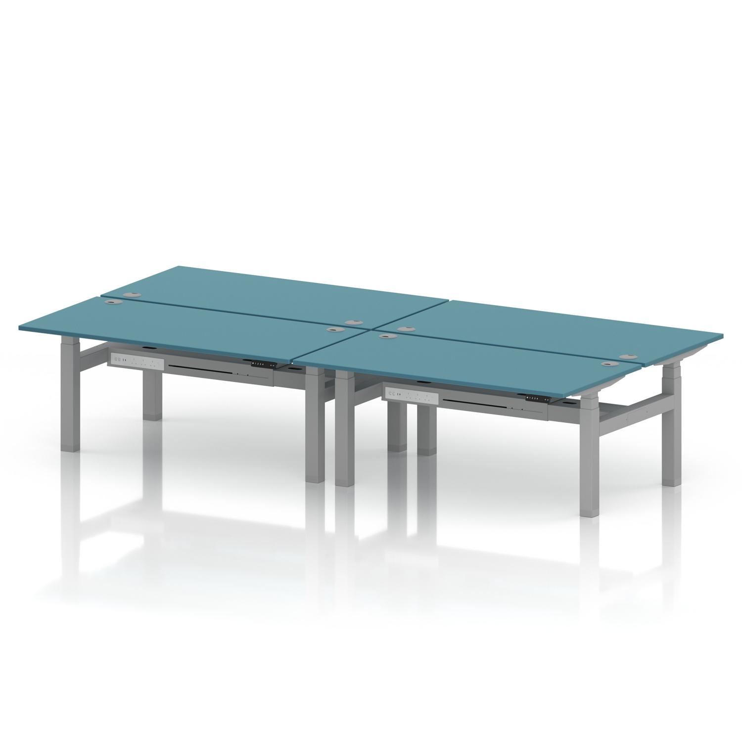 Air Back-to-Back 1600 x 800mm Height Adjustable 4 Person Office Bench Desk Dark Teal Top with Cable Ports Silver Frame Air Back-to-Back 1600 x 800mm Height Adjustable 4 Person Office Bench Desk Dark Teal Top with Cable Ports Silver Frame
