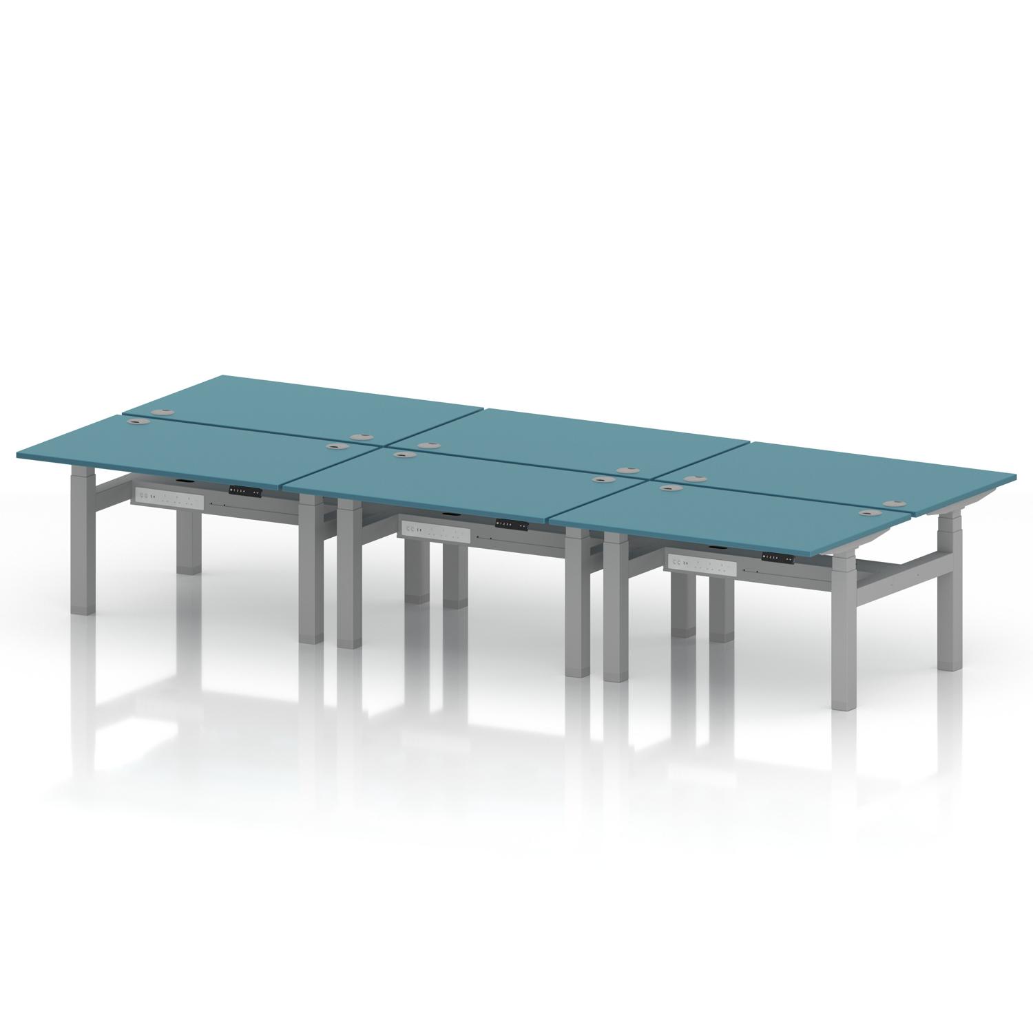 Air Back-to-Back 1200 x 800mm Height Adjustable 6 Person Office Bench Desk Dark Teal Top with Cable Ports Silver Frame Air Back-to-Back 1200 x 800mm Height Adjustable 6 Person Office Bench Desk Dark Teal Top with Cable Ports Silver Frame