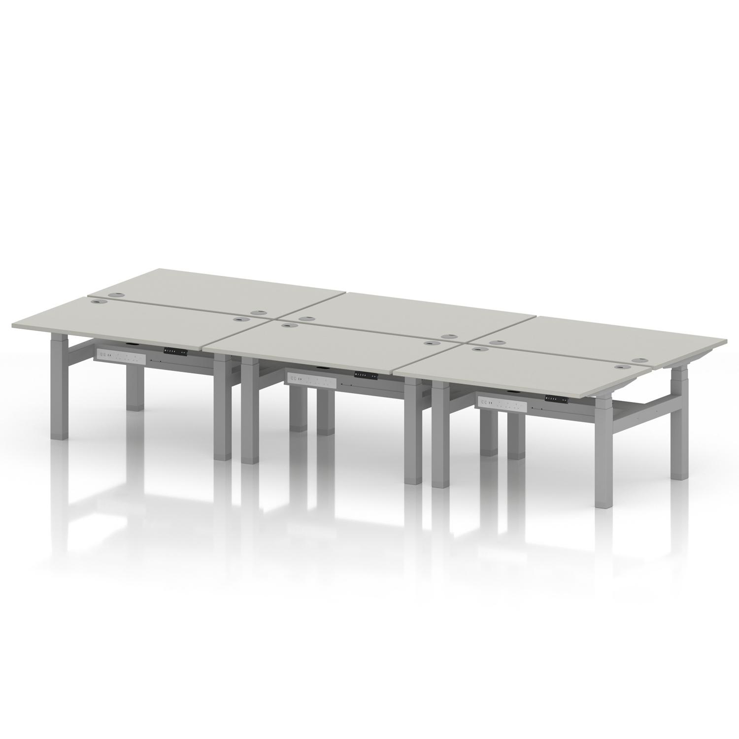 Air Back-to-Back 1200 x 800mm Height Adjustable 6 Person Office Bench Desk Dove Grey Top with Cable Ports Silver Frame Air Back-to-Back 1200 x 800mm Height Adjustable 6 Person Office Bench Desk Dove Grey Top with Cable Ports Silver Frame