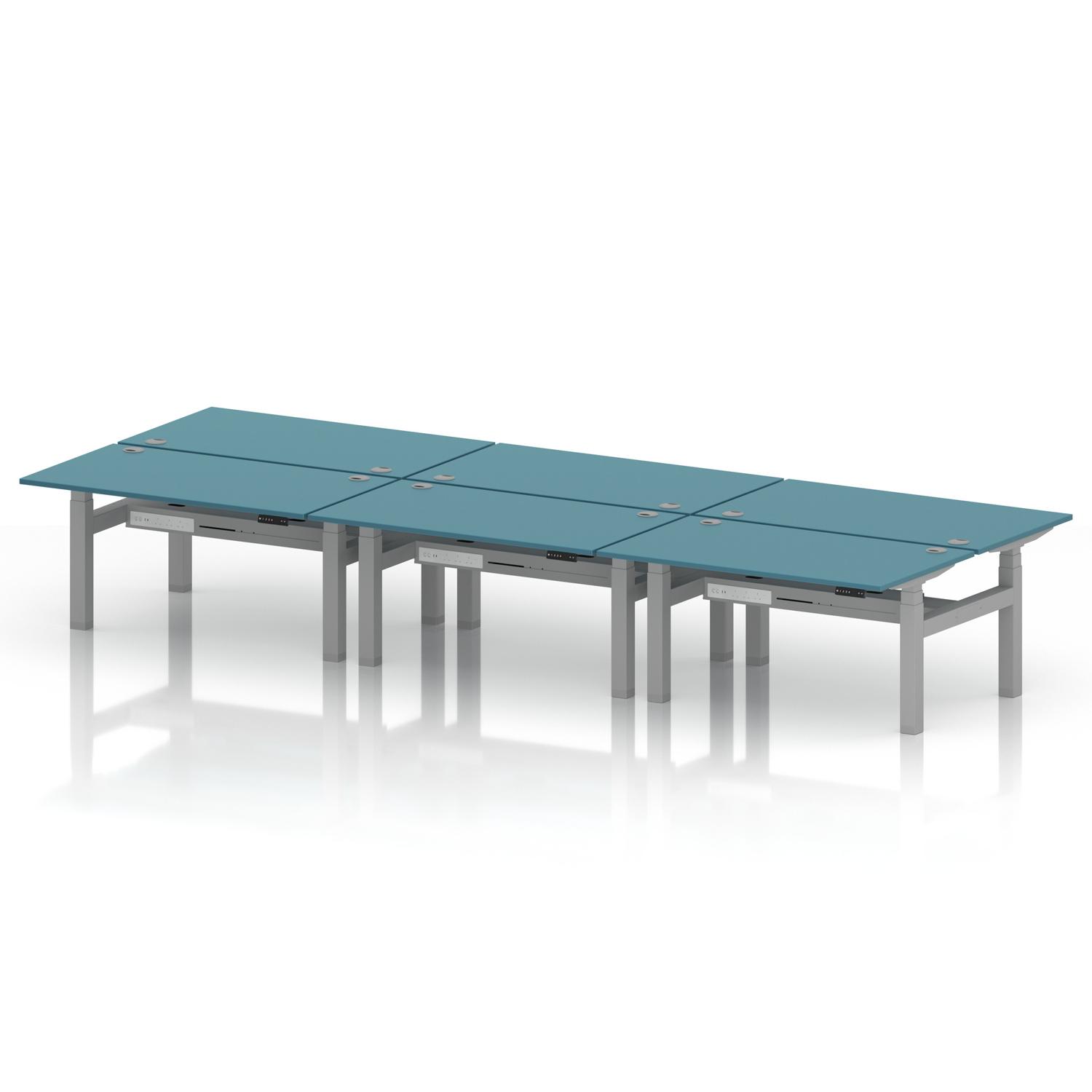 Air Back-to-Back 1400 x 800mm Height Adjustable 6 Person Office Bench Desk Dark Teal Top with Cable Ports Silver Frame Air Back-to-Back 1400 x 800mm Height Adjustable 6 Person Office Bench Desk Dark Teal Top with Cable Ports Silver Frame