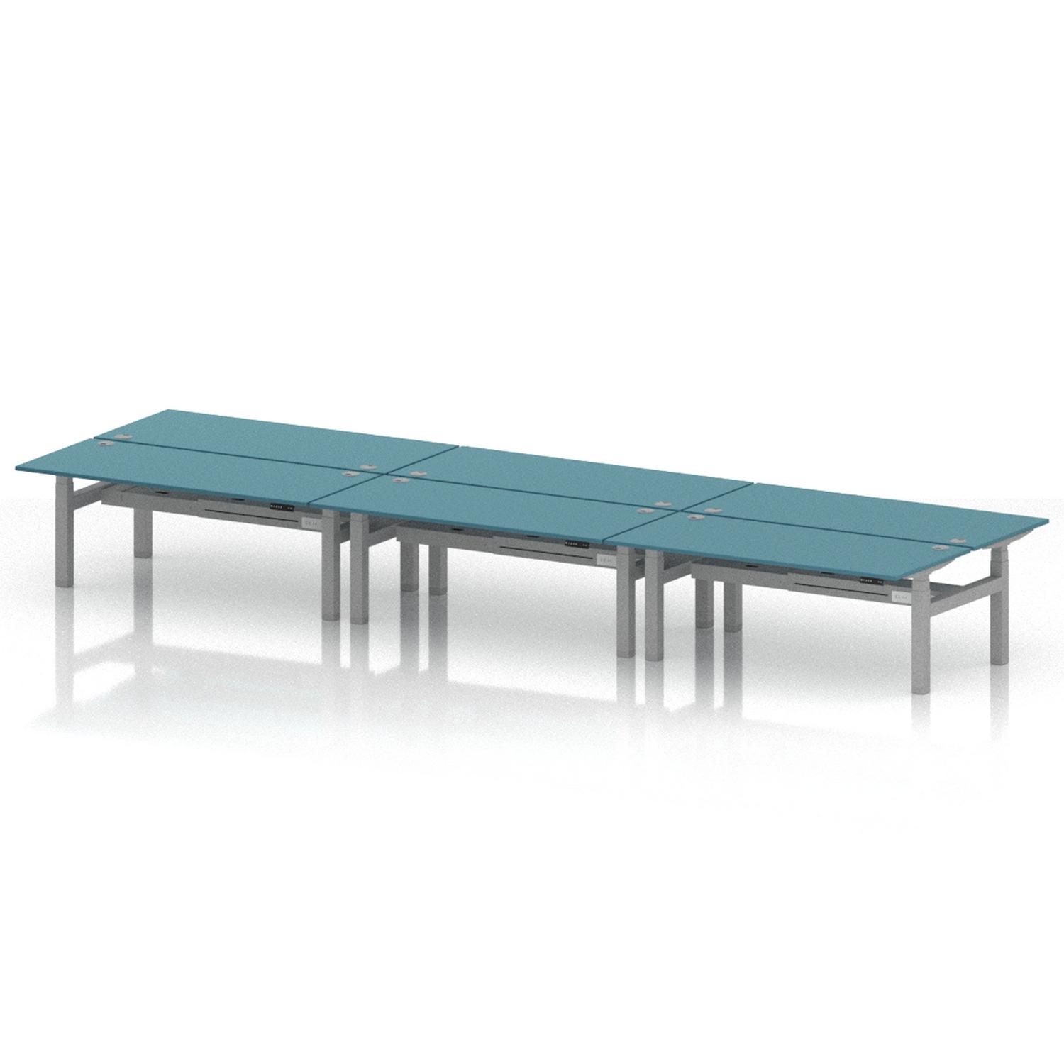 Air Back-to-Back 1800 x 800mm Height Adjustable 6 Person Office Bench Desk Dark Teal Top with Cable Ports Silver Frame Air Back-to-Back 1800 x 800mm Height Adjustable 6 Person Office Bench Desk Dark Teal Top with Cable Ports Silver Frame